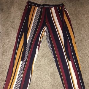 Striped, straight legged pants.